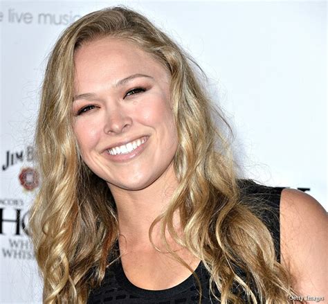 'Ultimate Fighter' Coach Ronda Rousey To Push Women's MMA | Newsmax.com