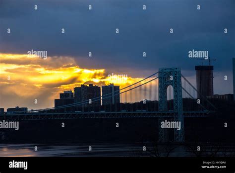 Sunset over the George Washington Bridge and Hudson River looking at NJ from NYC Stock Photo - Alamy