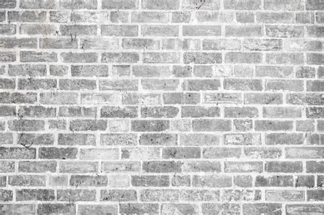 Premium Photo | Gray old brick wall background texture