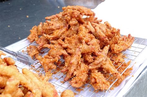 Premium Photo | Fried chicken at street food