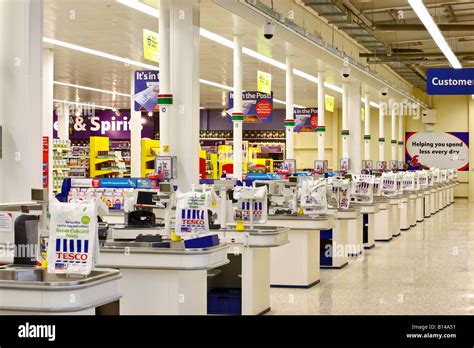 Supermarket checkout counters Stock Photo - Alamy