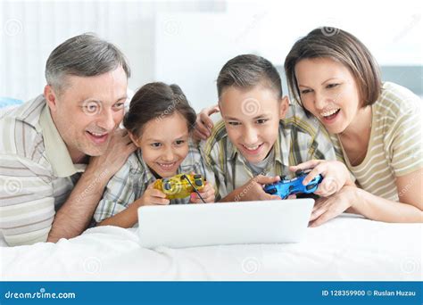 Portrait of Family Playing Computer Games, Parents with Kids Stock Photo - Image of ...