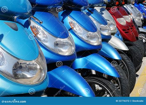 Mopeds or Scooters for Hire Stock Photo - Image of colorful, rental ...