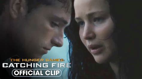 Catching Fire Katniss And Peeta Kiss On The Beach