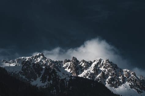 Premium Photo | View rocky mountains in snow