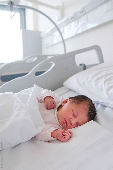 First Days Of A Newborn Baby Girl Sleeping In Hospital Room By Stocksy Contributor Giorgio ...