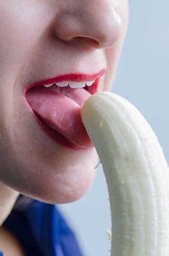 Close Up On Woman Eating Banana Suggestively Stock Photo - Download Image Now - iStock