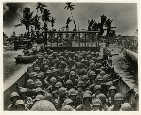 View of American soldiers aboard a landing craft on Kwajalein Atoll in ...