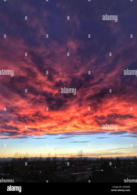 Fiery chinook arch clouds at sunset, in Calgary, Alberta, Canada Stock ...