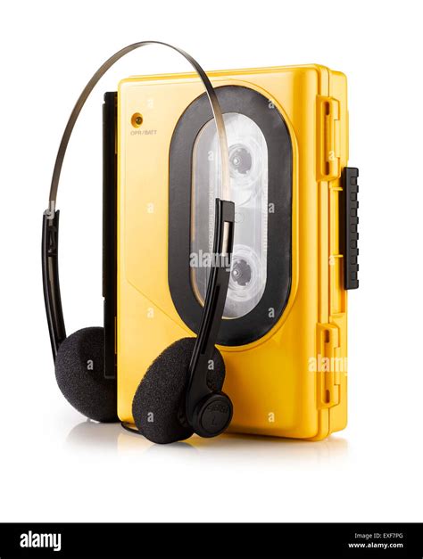 An old fashioned yellow portable Walkman style cassette player Stock ...