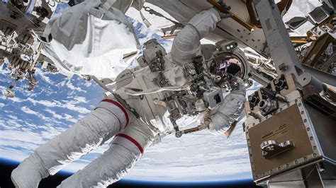 NASA astronauts spacewalk to repair, upgrade space station