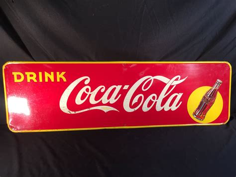 VINTAGE COCA-COLA ADVERTISING SIGN, MADE IN CANADA IN 1940 BY ST. THOMAS METAL SIGNS, LTD., 57''