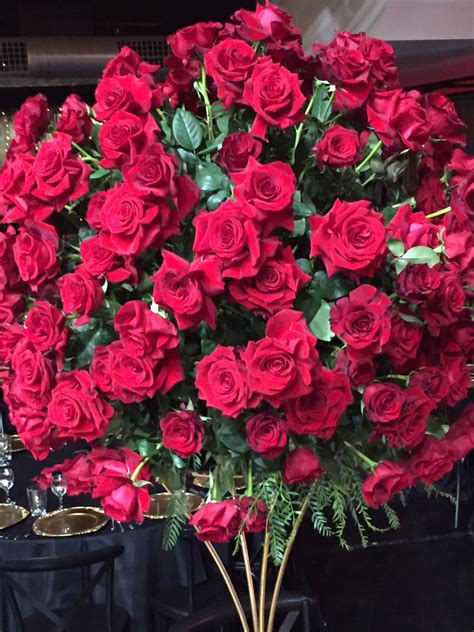 Lavish Red Rose Centrepiece | Red roses centerpieces, Rose centerpieces, Flower installation