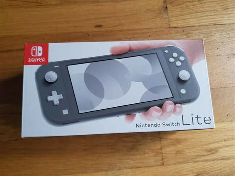 Nintendo Switch Lite - Grey NEW NEVER OPENED - iCommerce on Web