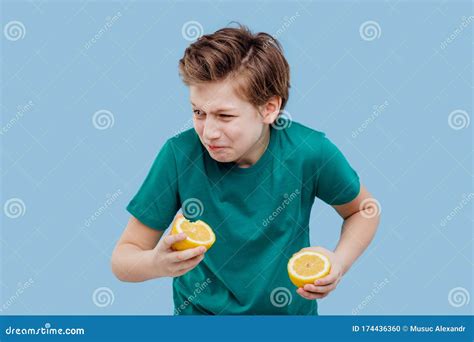 Boy he Feels the Taste of Lemon, Sour Taste, Stock Photo - Image of funny, children: 174436360