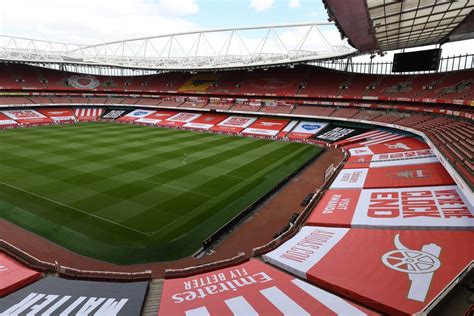 Arsenal prepare Emirates Stadium with banners and tributes to 47 fans lost to coronavirus ...