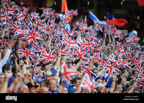 Rangers fans wave union jack flags in the stands hi-res stock photography and images - Alamy