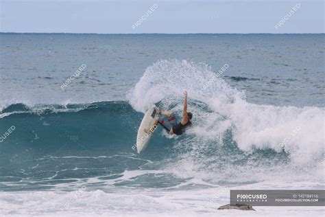 Man surfing, Hawaii — watersport, vitality - Stock Photo | #142184116