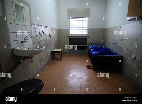 Prison cell, former East German Stasi prison of Hohenschoenhausen ...