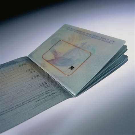 Biometric Passport Chip Photograph by Steve Horrell