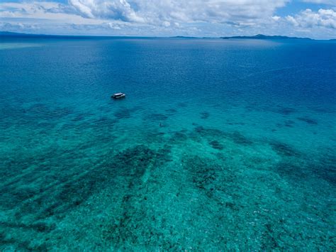 Aerial Photo of Boat on Sea · Free Stock Photo