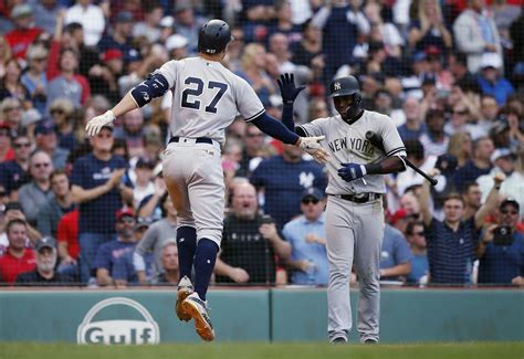 Red Sox fan hits Yankees' Giancarlo Stanton after throwing back home ...