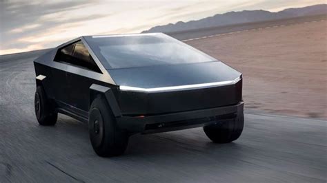 Breaking: Tesla Chief Designer Spotted Driving the 1st Stealth Matte Black Cybertruck | Torque News