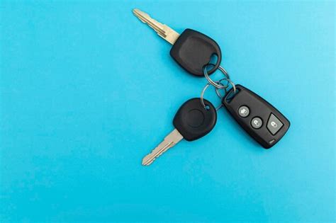 Premium Photo | Car keys on blue background