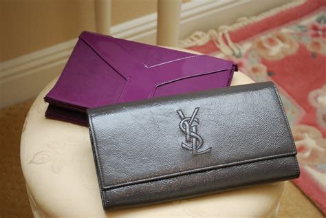 Purse Addict: YSL $28 Eyeliner...Skip, YSL Promotional Clutch...KEEP