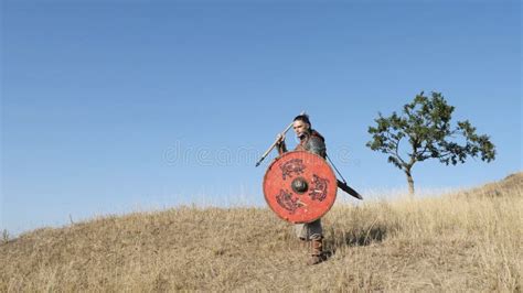 A Viking Warrior Throws a Spear during an Attack. Stock Image - Image ...