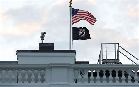 POW-MIA flag back atop White House, reversing Trump era decision | Reuters