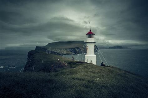 Lighthouse at mykines stock image. Image of mykines - 232670523