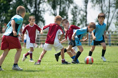 kids playing football outside - Bronchiectasis
