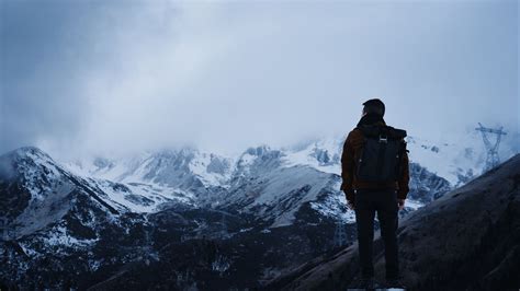 Man Is Standing Alone On Rock In White Mountains Background 4K HD Alone ...