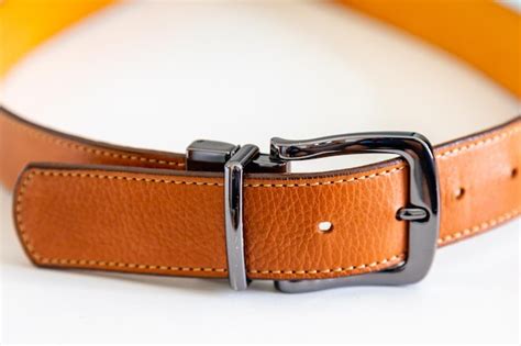 Premium Photo | A leather belt with a buckle on it