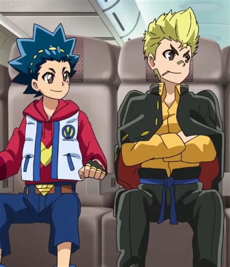 two anime characters sitting on seats in front of each other, one with ...