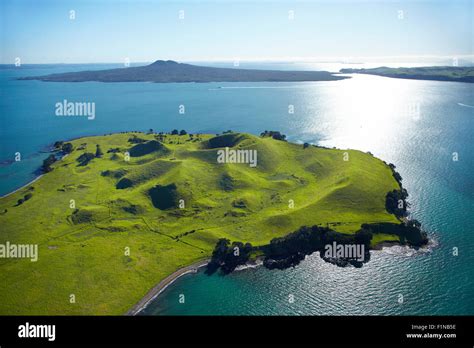 Volcanic craters on Browns Island, or Motukorea, and Rangototo Island in distance, Hauraki Gulf ...