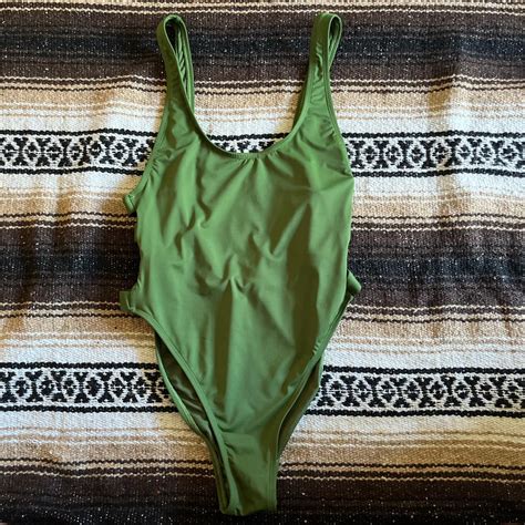 green one piece swimsuit/bodysuit - high leg, low... - Depop