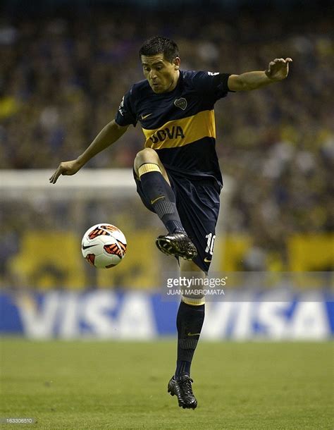 Argentina's Boca Juniors midfielder Juan Roman Riquelme controls the ...