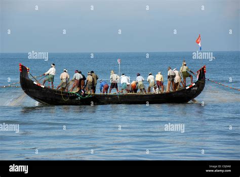 Net fishing in traditional fishing boat. Kerala. India Stock Photo: 34823216 - Alamy