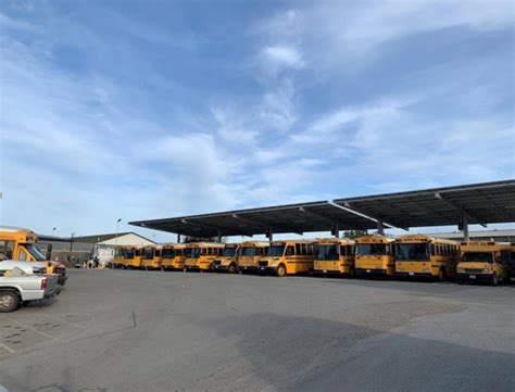 Solar Canopies Shade District's School Bus Fleet While Generating ...