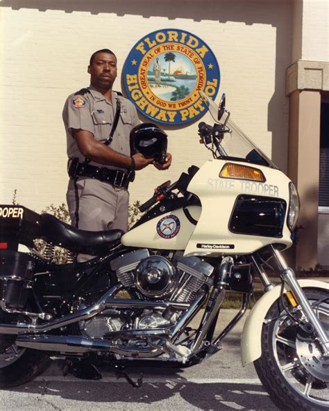 Florida Memory • Florida Highway Patrol State Trooper with his motorcycle in front of the ...