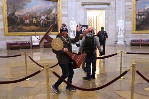 Adam Johnson, seen with Nancy Pelosi's lectern in Capitol riot ...