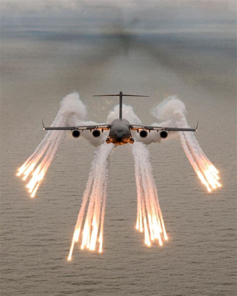 C-17 Globemaster III Pops Flares . . . Photographed by Richard Ellis ...