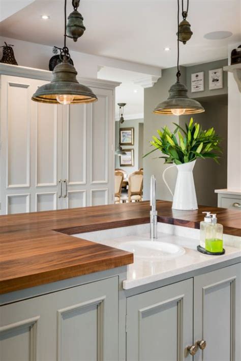 Pendant Lighting: Ideas and Options - Town & Country Living | Farmhouse kitchen lighting ...