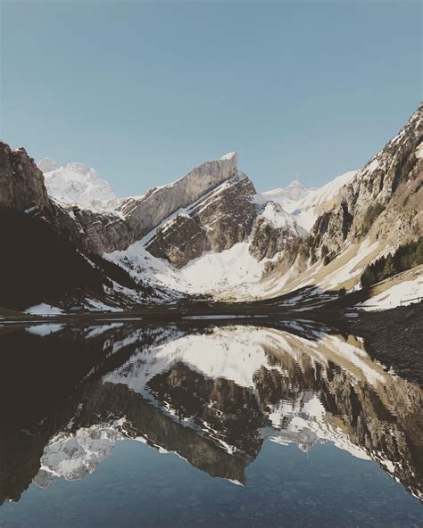 Reflections in lake Seealp, Appenzell, Switzerland. : r/hiking