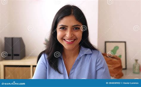 Joyful Young Indian Woman Smile at Camera Sitting on Desk at Home Office. Stock Footage - Video ...