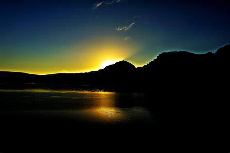 Sunrise on St Marys Lake Photograph by Matthew Winn - Fine Art America