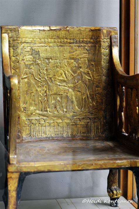 Gilt chair from Yuya and Tuya tomb depicting queen Tiye with her cat and daughter Sitamun with ...