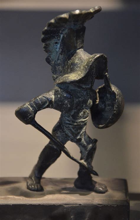 Bronze statuette of a hoplomachus (a type of gladiator in ancient Rome, armed to resemble a ...